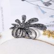 Black Cubic Zirconia & Silver-Plated Flower Brooch Supply